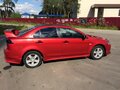 2008 Mitsubishi Lancer X, красный - вид 7