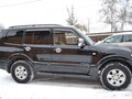 2003 Mitsubishi Pajero III, чёрный - вид 1