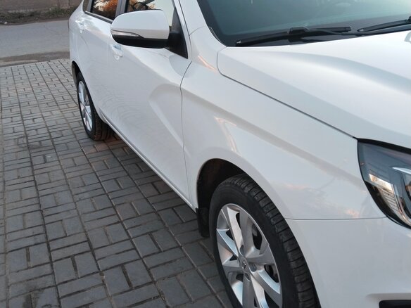 2024 Lada (ВАЗ) Vesta I Рестайлинг (NG), белый - вид 4