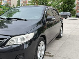 2010 Toyota Corolla X (E140, E150) Рестайлинг, чёрный, 930000 рублей, вид 3
