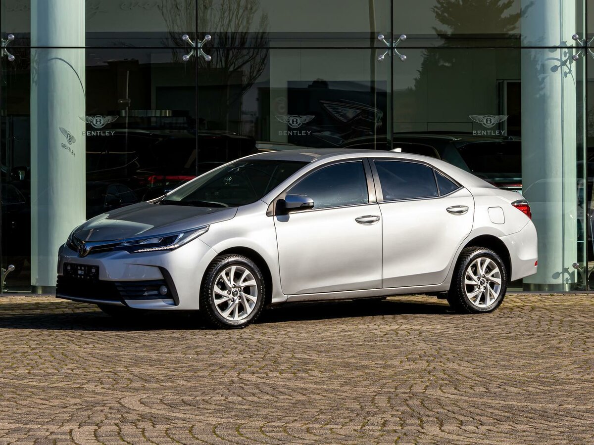 Toyota Corolla XI (E160, E170, E180) Рестайлинг 1