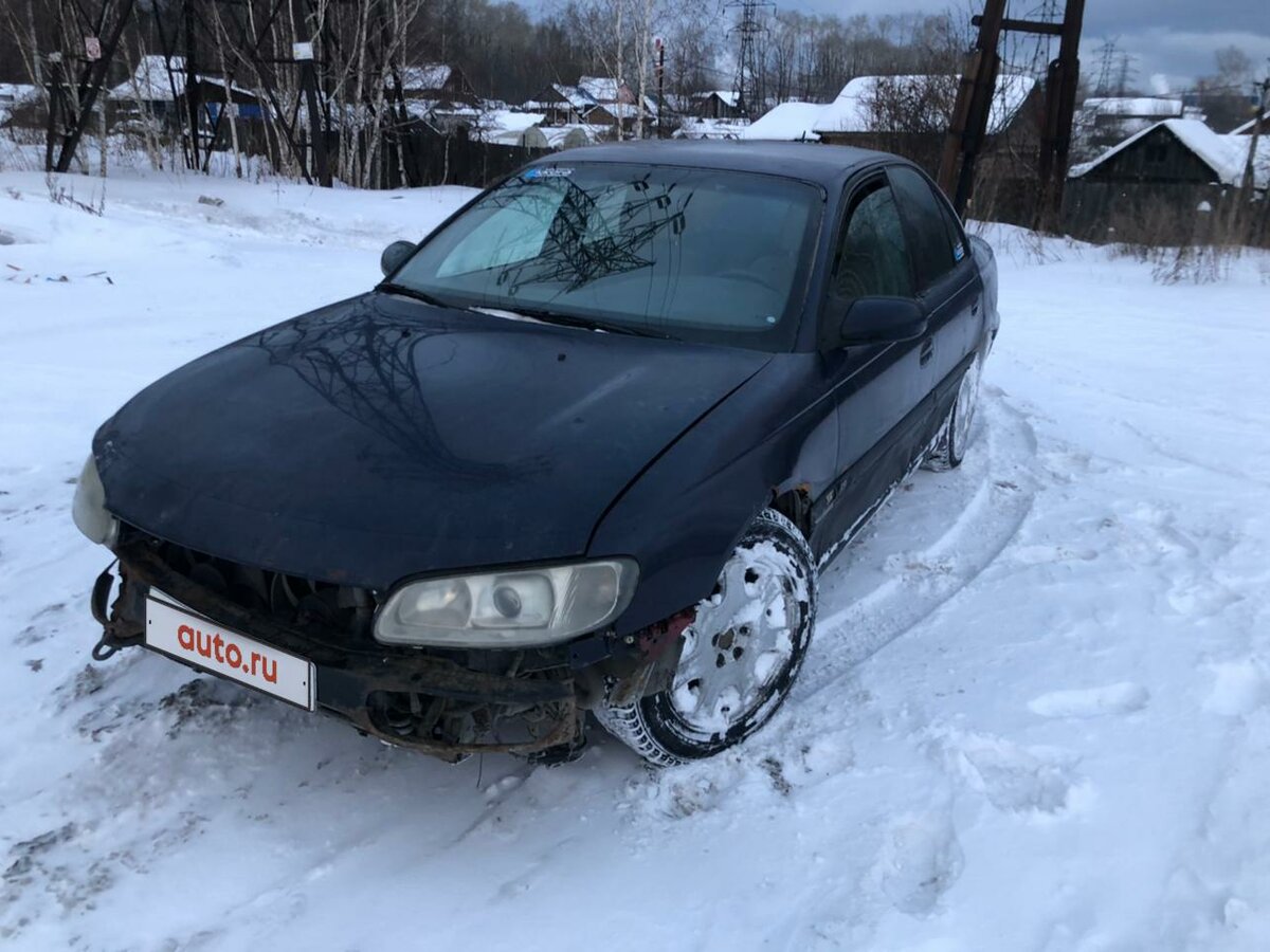 Синий опель омега