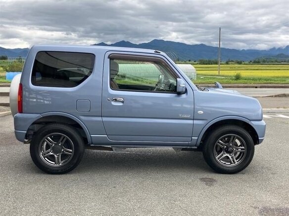 2010 Suzuki Jimny Kei car III Рестайлинг 1, голубой - вид 6