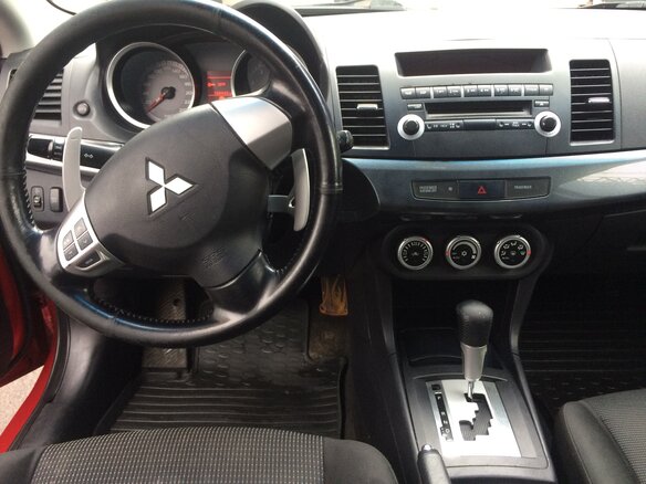 2008 Mitsubishi Lancer X, красный - вид 11