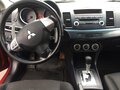 2008 Mitsubishi Lancer X, красный - вид 11