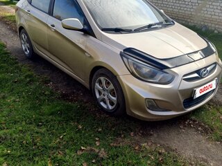2011 Hyundai Solaris I, бежевый, 450000 рублей, вид 1