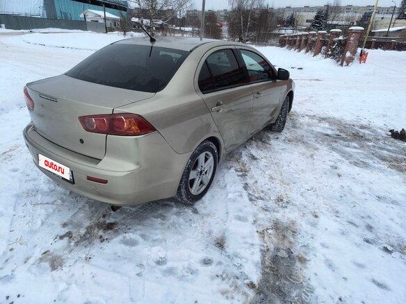 2007 Mitsubishi Lancer X, золотистый, 720000 рублей - вид 4
