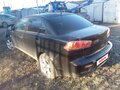 2008 Mitsubishi Lancer X, чёрный, 350000 рублей - вид 3