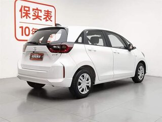 2023 Honda Fit IV Рестайлинг, белый, 965000 рублей, вид 4