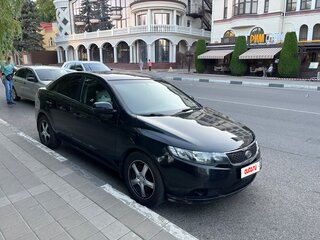 2011 Kia Cerato 6-speed II, чёрный, 700000 рублей, вид 1