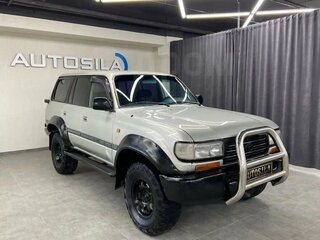 1995 Toyota Land Cruiser 80 Series Рестайлинг, серебристый, 1270009 рублей, вид 1