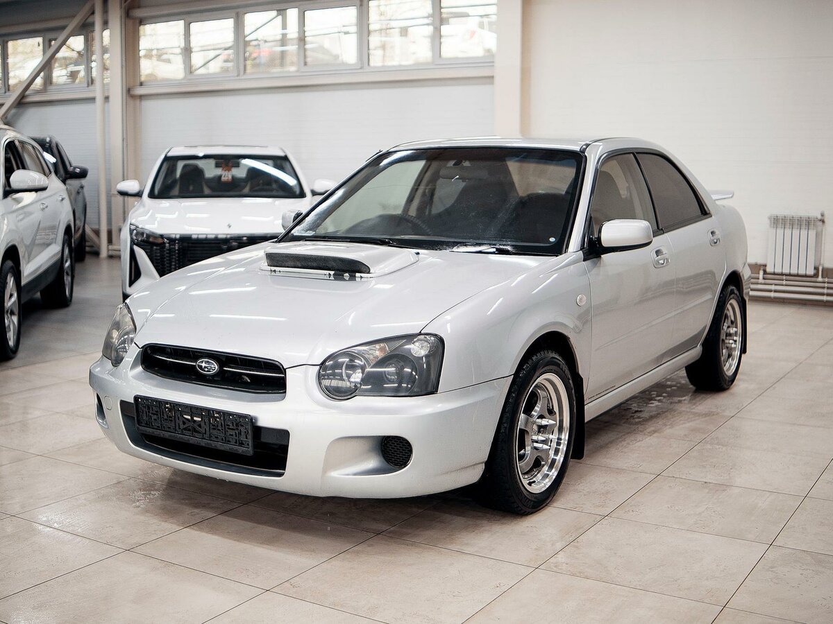 Subaru Impreza II Рестайлинг 1