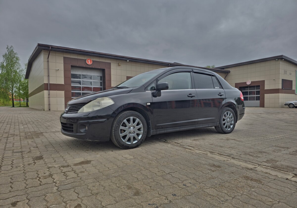 Nissan Tiida I, фото 9