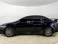 2008 Mitsubishi Lancer X, чёрный, 750000 рублей - вид 3