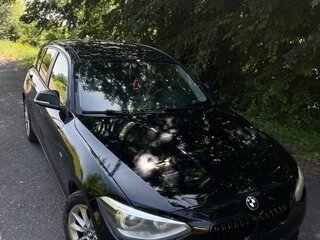 2012 BMW 1 серии 118i II (F20/F21), чёрный, 415000 рублей, вид 1