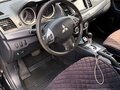 2008 Mitsubishi Lancer X, чёрный, 550000 рублей - вид 8