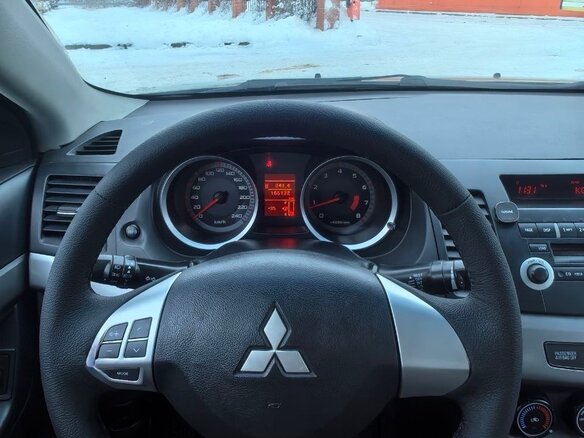 2007 Mitsubishi Lancer X, золотистый, 720000 рублей - вид 9