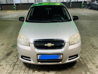 2011 Chevrolet Aveo I Рестайлинг, серебристый, 270000 рублей, вид 1