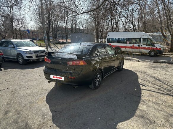 2008 Mitsubishi Lancer X, чёрный, 620000 рублей - вид 4