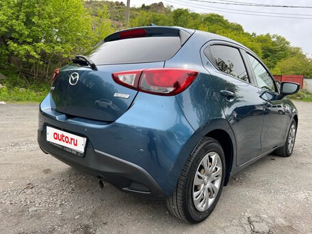 Купить б/у Mazda Demio IV (DJ) 1.5 AT (110 л.с.) бензин автомат во