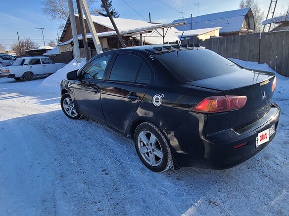 2007 Mitsubishi Lancer X, чёрный, 449000 рублей - вид 2