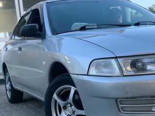 1999 Mitsubishi Lancer VII, серебристый, 220000 рублей, вид 1