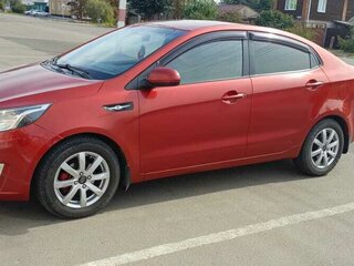 2011 Kia Rio 5-speed III, красный, 760000 рублей, вид 1