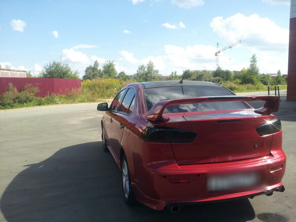 2008 Mitsubishi Lancer X, красный - вид 8