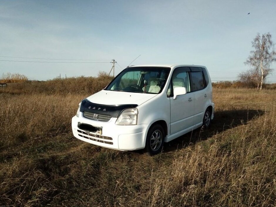 Машина Honda capa