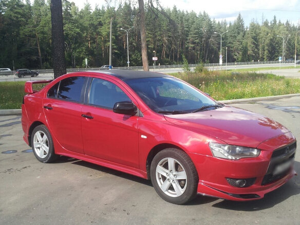 2008 Mitsubishi Lancer X, красный - вид 2