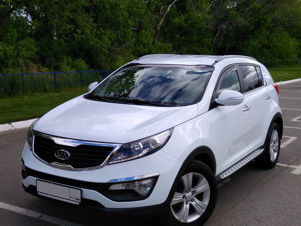 Купить б/у Kia Sportage III 2.0d AT (136 л.с.) 4WD дизель автомат в Брянске: сер