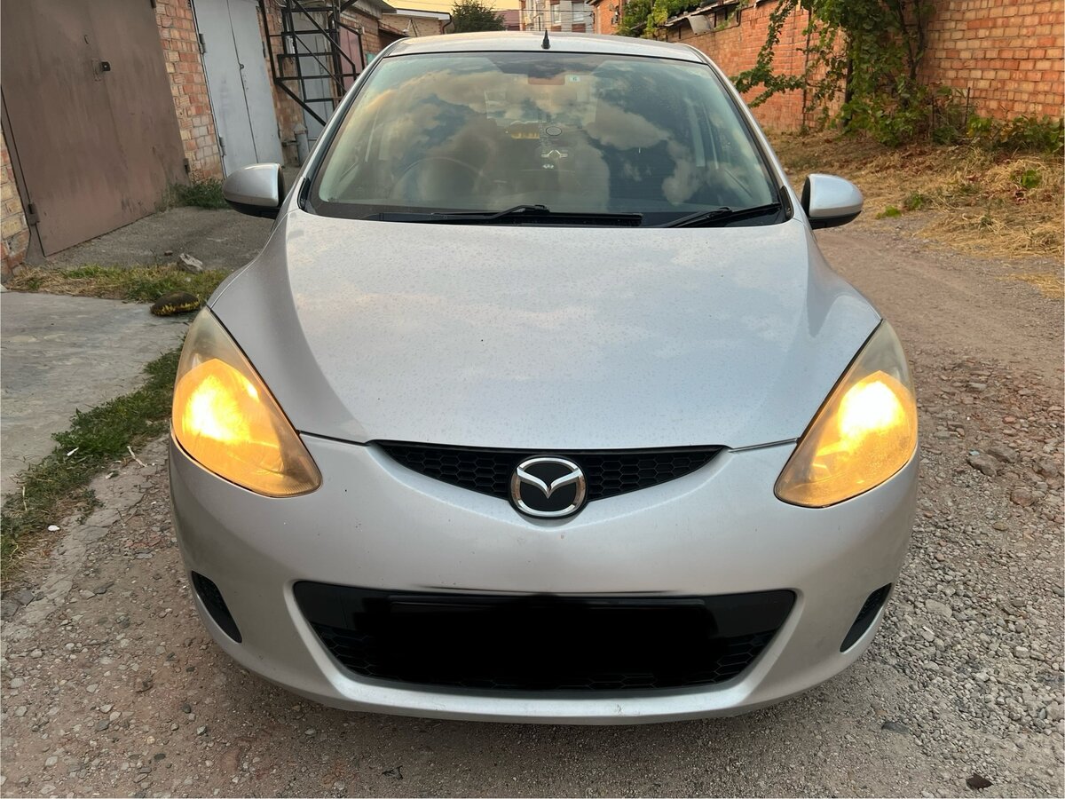 Купить б/у Mazda Demio III (DE) 1.4 AT (91 л.с.) бензин автомат в ...