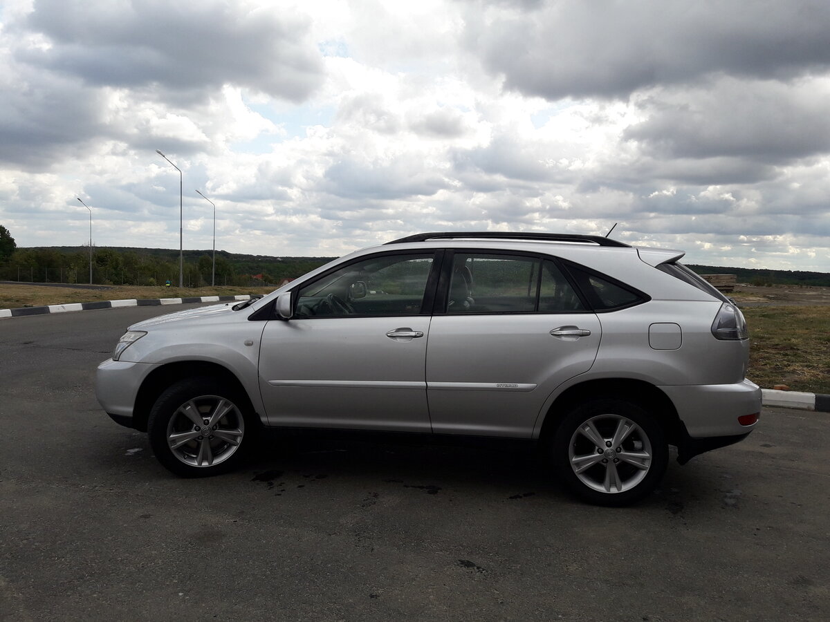 Купить б/у Lexus RX II Рестайлинг 400h 3.3hyb CVT (211 л.с