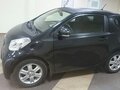 2009 Toyota iQ, чёрный - вид 7