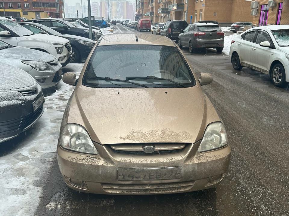 Киа рио золотистый