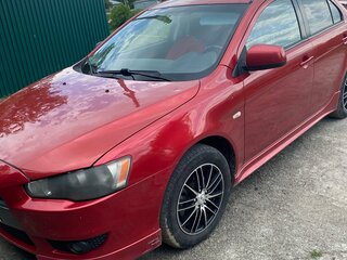 2010 Mitsubishi Lancer X, красный, 800000 рублей, вид 1