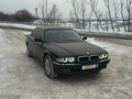1997 BMW 7 серии 728i III (E38), чёрный - вид 6