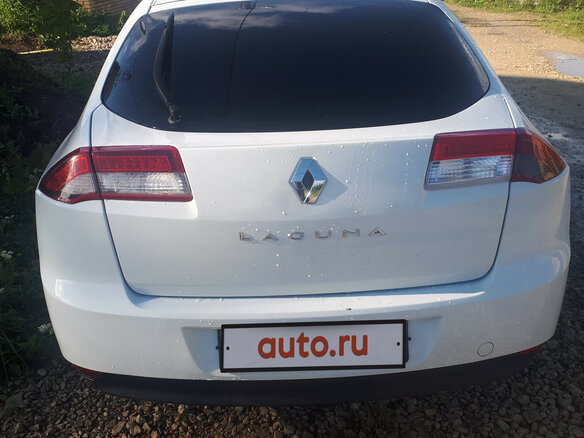 2011 Renault Laguna III Рестайлинг, белый - вид 1