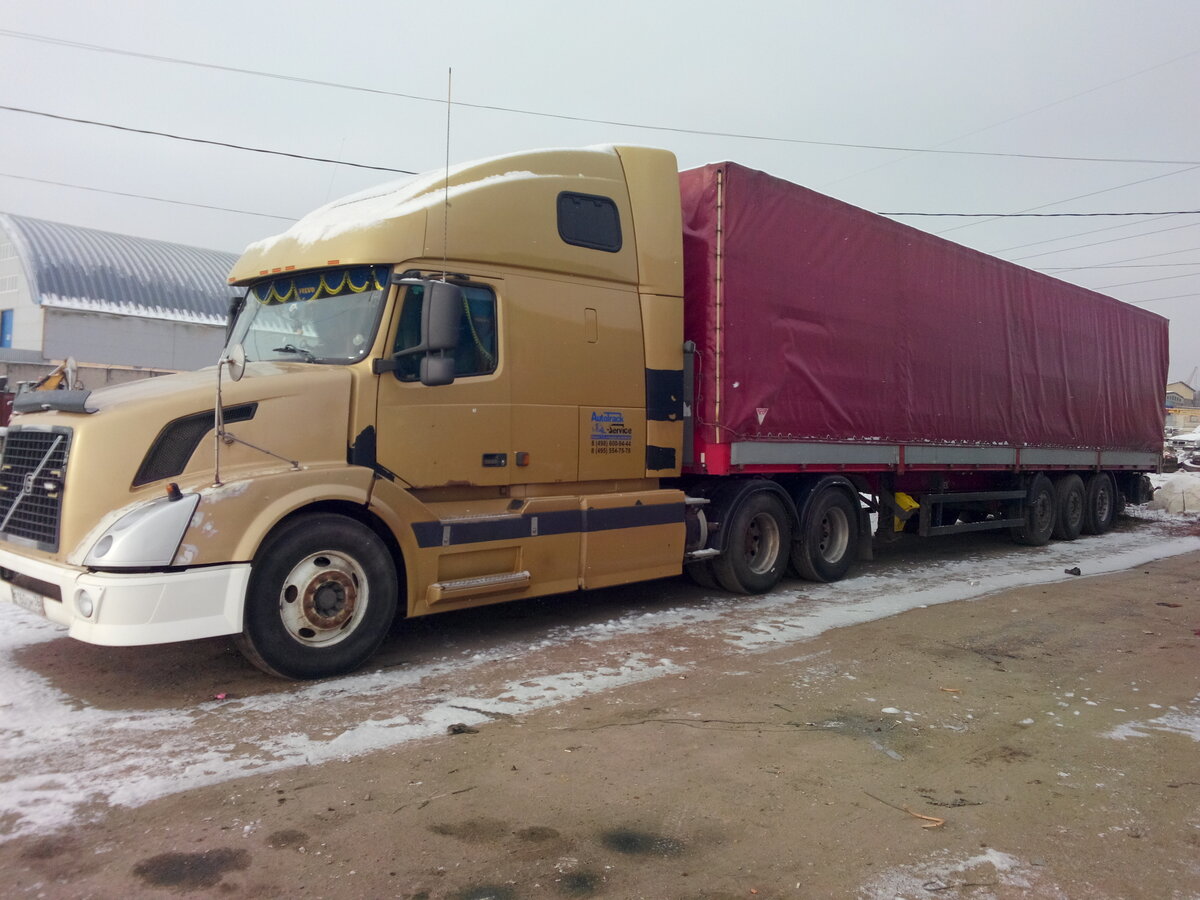Volvo VNL 670 С прицепом