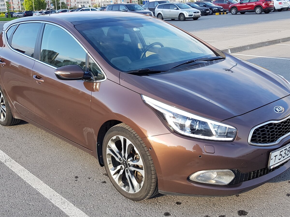 Купить б/у Kia Cerato III 1.6 AT (130 л.с.) бензин автомат в Казани: коричневый 