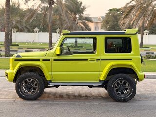 2021 Suzuki Jimny Sierra IV, жёлтый, 1700055 рублей, вид 4