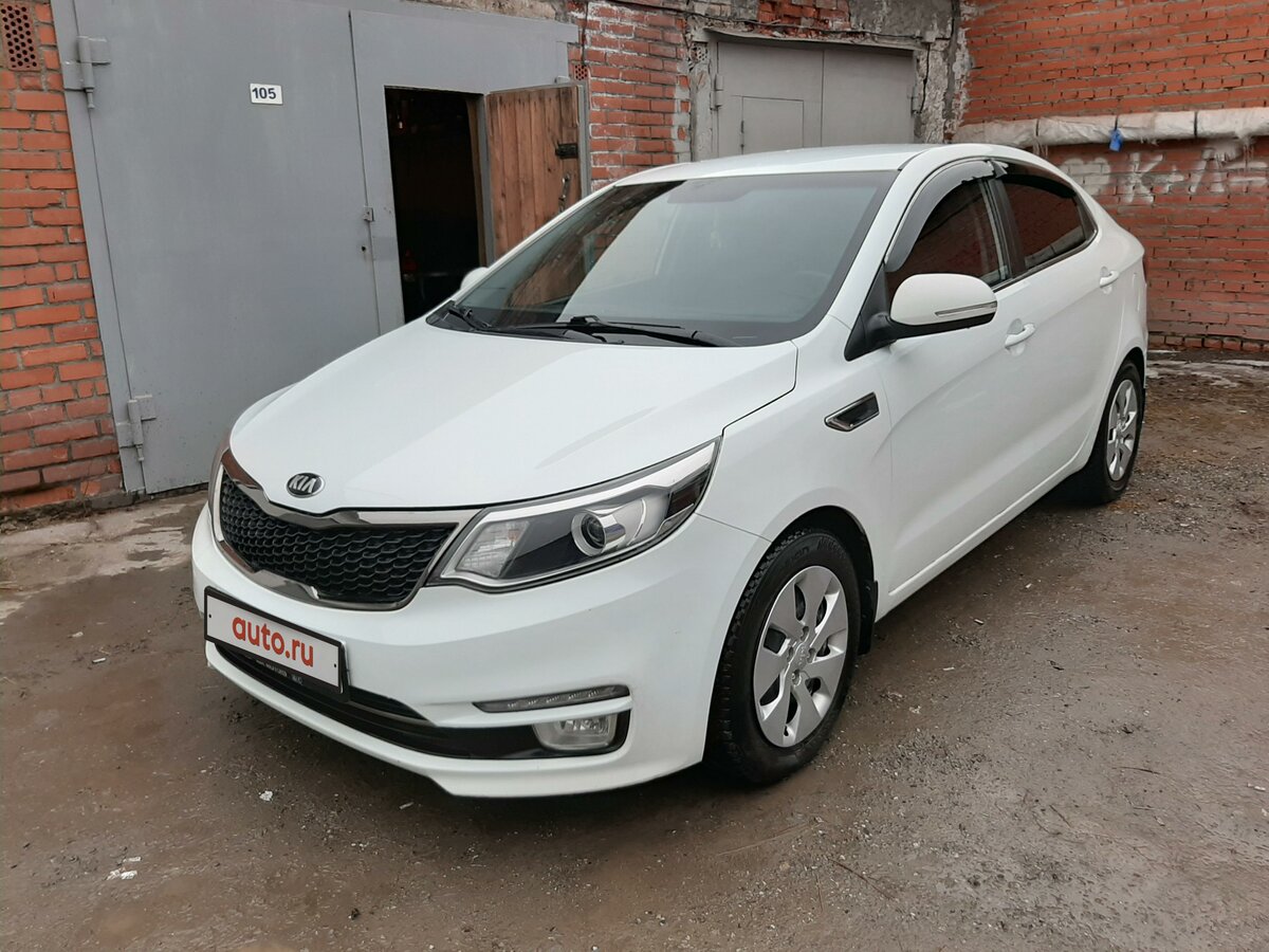 Kia Rio 2015 белый седан