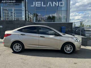 2011 Hyundai Solaris I, серый, 560000 рублей, вид 4