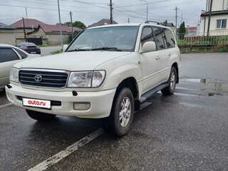 2001 Toyota Land Cruiser Cygnus 100 Series, белый, 1100000 рублей, вид 1