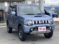 2010 Suzuki Jimny Kei car III Рестайлинг 1, голубой - вид 1