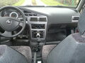 2009 Daewoo Nexia I Рестайлинг, пурпурный - вид 1