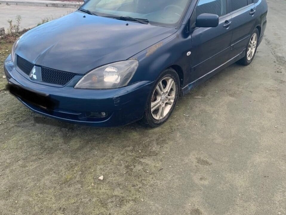 Купить б/у Mitsubishi Lancer IX Рестайлинг 2.0 AT (135 л.с.) бензин ...