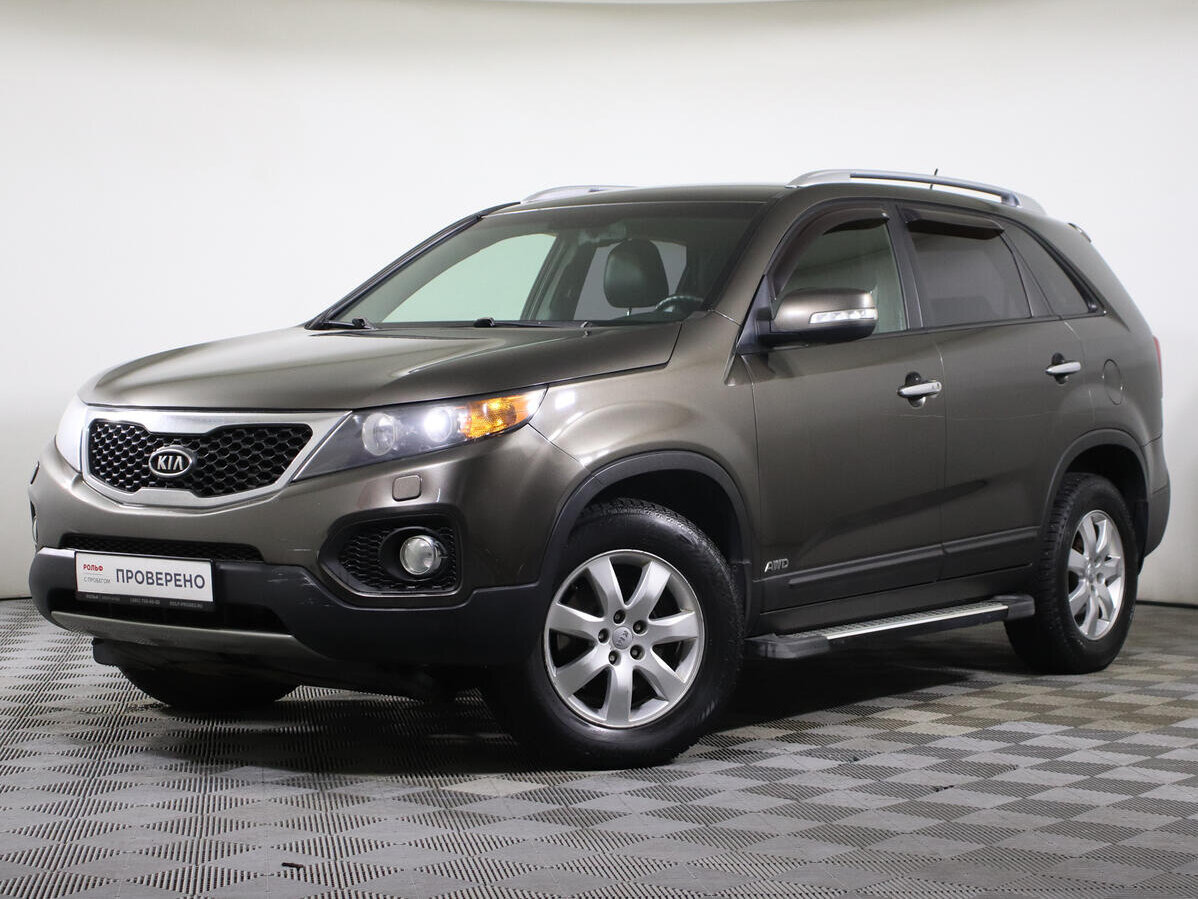 Купить б/у Kia Sorento II 2.4 AT (175 л.с.) 4WD бензин автомат в Москве: бежевый