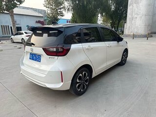2022 Honda Fit Crosstar IV Рестайлинг, белый, 1030000 рублей, вид 4