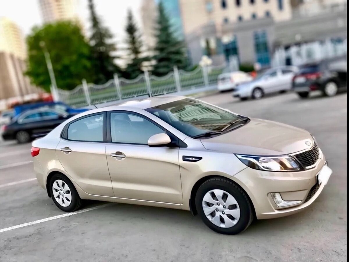Kia Rio 3 бежевая
